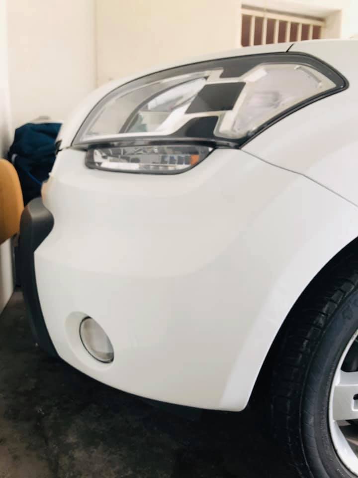 After - White car bumper repaired