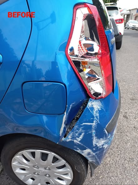 Before - Blue car rear quarter panel damage